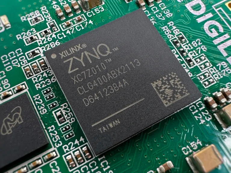 A close-up of the XILINX ZYNQ microchip on the ZYBO Development Board.